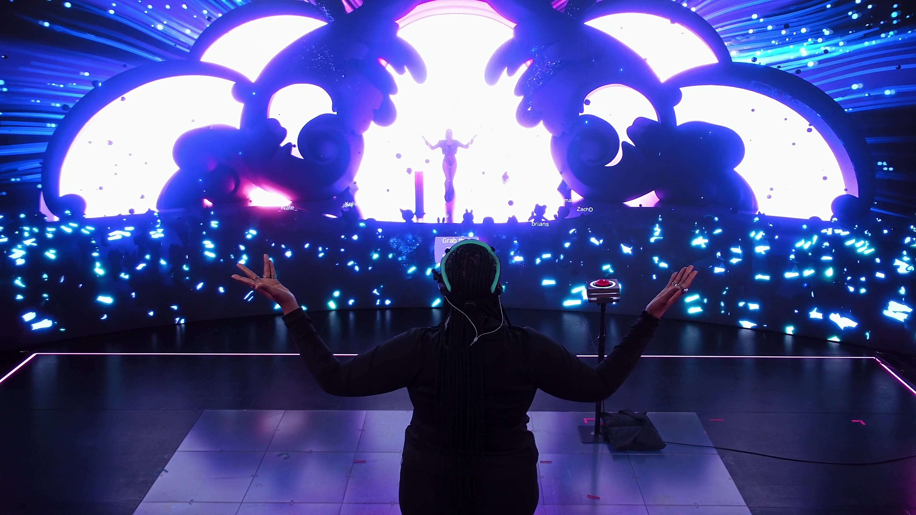 Audience perspective with silhouetted avatar