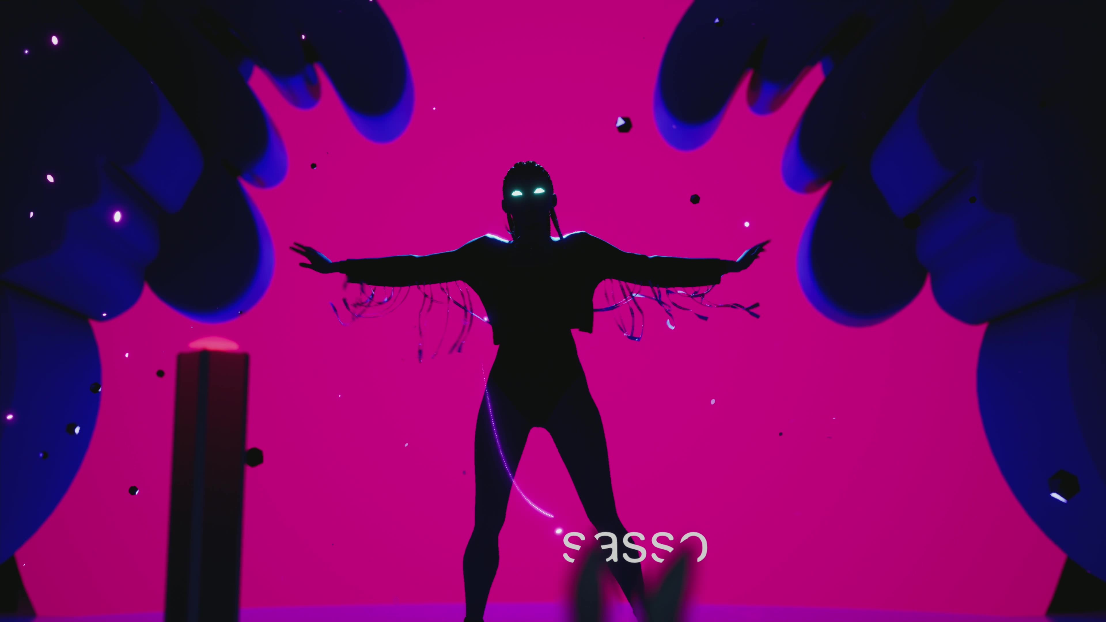 Silhouetted performer against vibrant magenta background